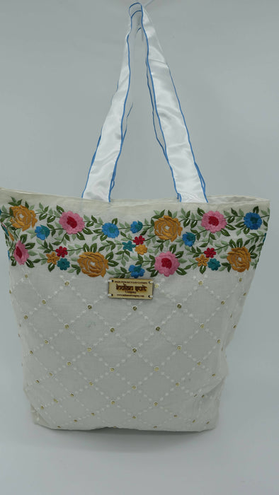 Off White Cotton Floral Embroidered Tote Bag With White And Blue Ribbon Handle