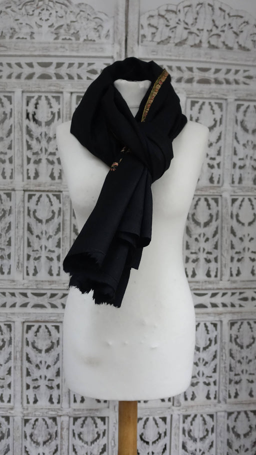 Black wool shawl with pink, green and blue floral embroidery