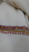 Cream wool shawl with orange, black and ochre corner motifs – view 2