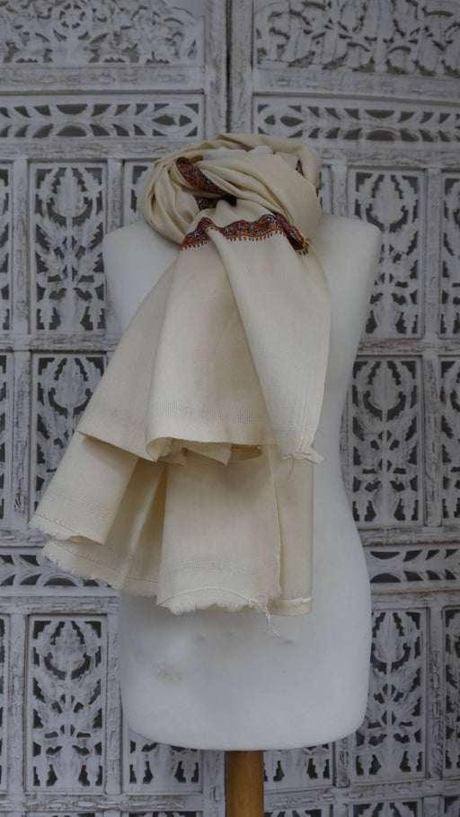 Large cream wool shawl with orange, black and ochre embroidery