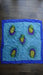 Pack of four pure silk squares – close-up of the embellishment