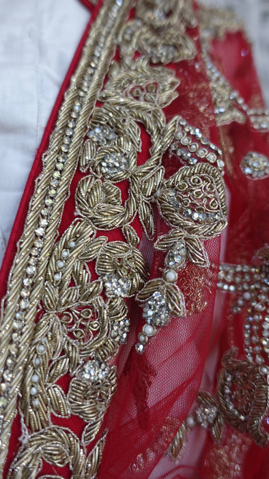 Red net zardosi curved wedding dupatta – close-up of the embellishment