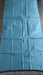 Teal and black 2 tone pure silk scarf – close-up of the embellishment