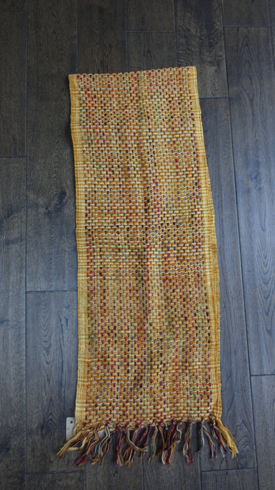 Rusty brown hands and looms woven scarf – shown draped
