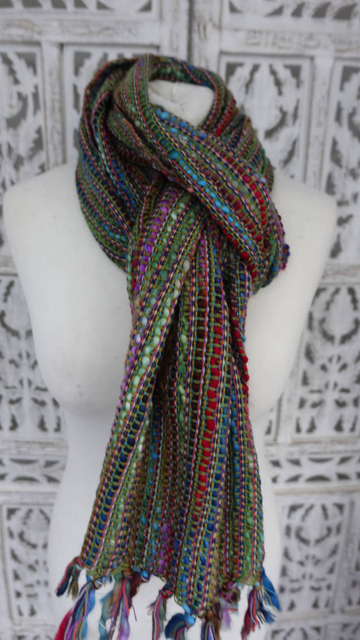 Earthy toned hands and looms woven colourful scarf