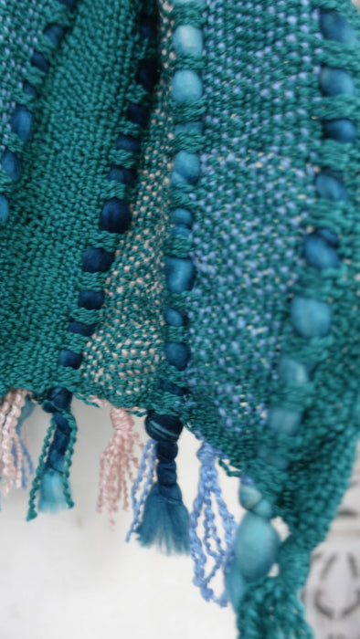 Jade hands and looms winter scarf – close-up of the embellishment