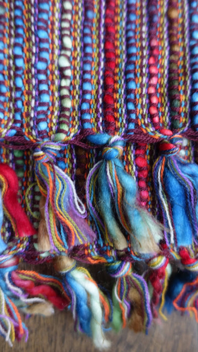 Colourful hands and looms colourful winter scarf – fabric and colour detail