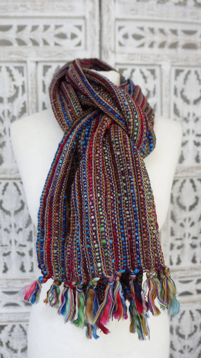 Colourful hands and looms colourful winter scarf