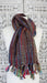 Colourful hands and looms colourful winter scarf