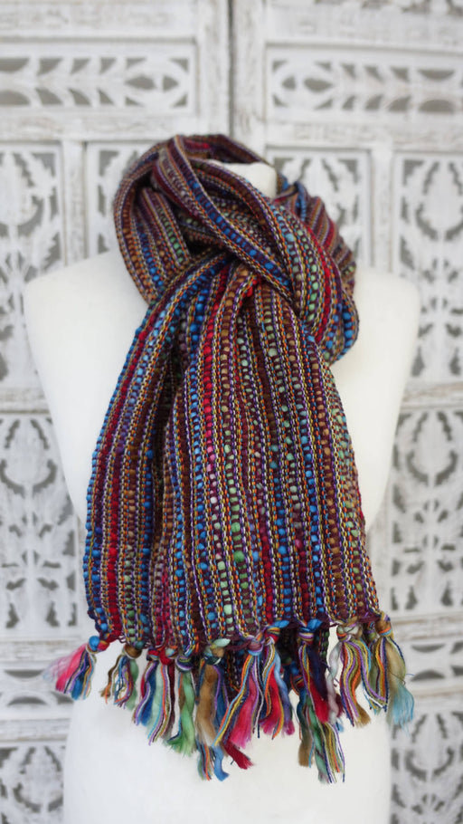 Colourful hands and looms colourful winter scarf